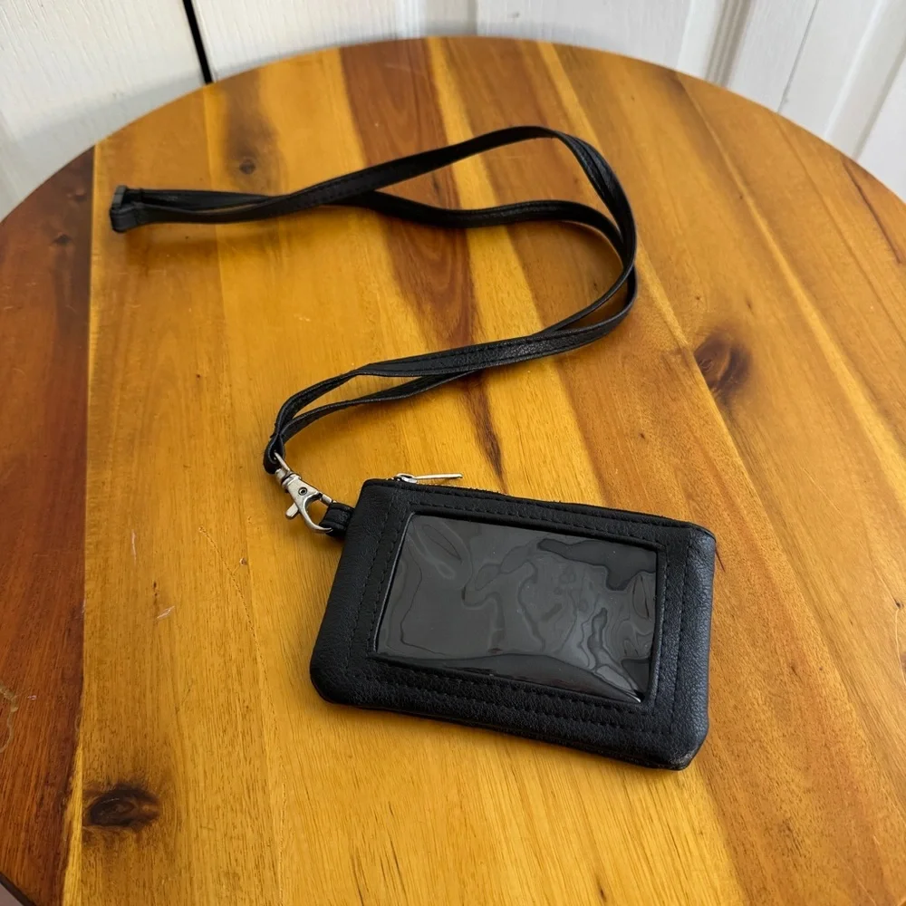 Claire’s black‎ faux leather eyes lashes crossbody